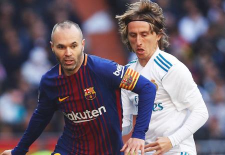 https://storage.bljesak.info/article/469307/450x310/iniesta modric.jpg